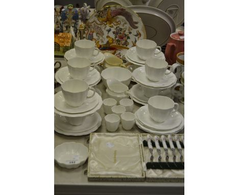 A Royal Crown Derby ten-setting tea service, of plain design, comprising teacups, saucers and side plates; egg cups, etc., gr