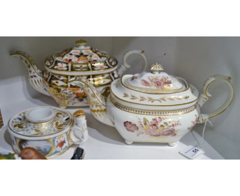 A Derby Imari boat shaped teapot, decorated with stylised foliage, button finial, ball feet, 16cm high, crown, crossed batons