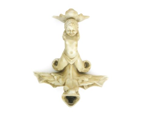 An unusual Doulton Burslem wall light,   modelled as a winged cherub riding a dragon, covered in a vellum glaze, printed fact