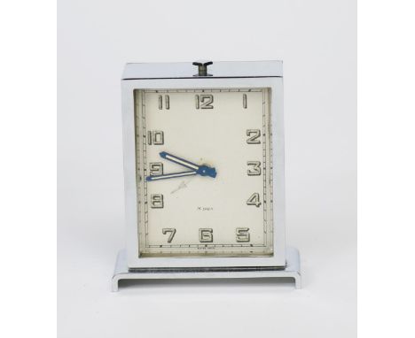 An Art Deco chrome travelling timepiece in original fitted case retailed by Harrods, rectangular form with Swiss 8 day moveme