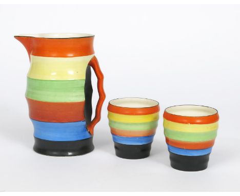 A Crown Devon Art Deco jug and two beakers, pattern 1808, ribbed cylindrical form, painted with bands in shades of orange, ye