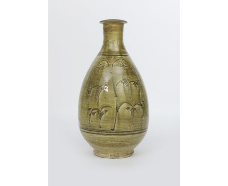 Jim Malone (born 1946) a tall Ainstable Pottery stoneware bottle vase, incised with Willow tree motif, glazed to the foot in 