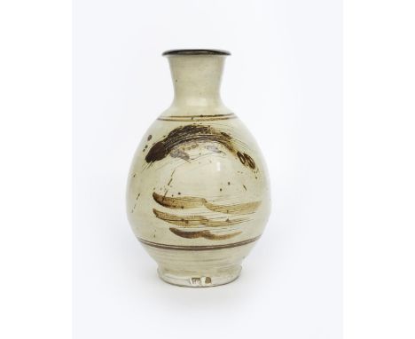 Jim Malone (born 1946) an Ainstable Pottery stoneware Korean fish vase, bottle shaped, incised and painted with a fish swimmi