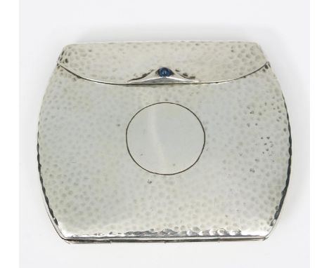 A Cohen &amp; Charles silver cigarette case, hinged, rounded rectangular form, the clasp set with blue glass stone, a shagree