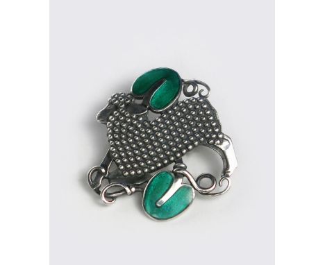 A Georg Jensen silver and enamel brooch designed by Arno Malinowski, model no.284, pierced and cast in low relief with a lamb