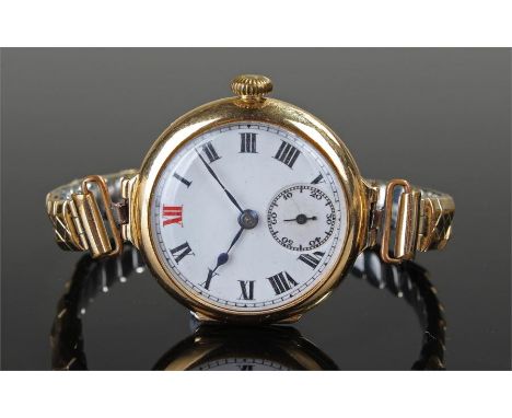 18 carat gold ladies wristwatch, the white enamel dial with Roman hours, subsidiary seconds dial, manual wound, on a later el