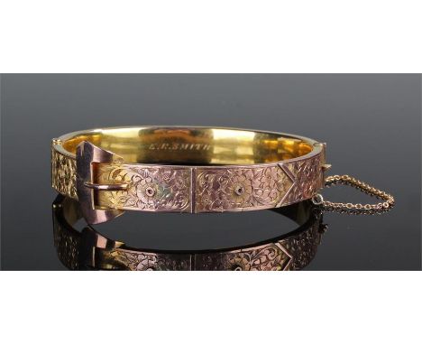 9 carat gold bangle, in the form of belt, named to the internal rear, 13.4 grams