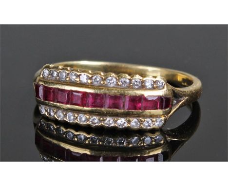 18 carat gold ruby and diamond ring, with a central band of 9 rubies and two bands of eleven diamonds to the top and bottom, 