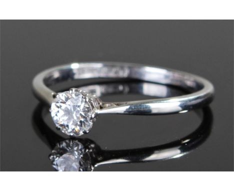 18 carat white gold diamond solitaire ring, the central diamond at approximately 0.6 carat, ring size R