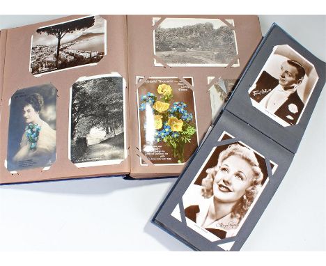 Two albums of postcards, the first to include 1930's film stars, Fred Astaire, Ginger Rogers, Dick Powell, Spencer Tracey, ap