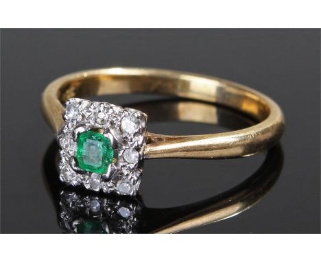 18 carat gold diamond and emerald set ring, the princess cut emerald surrounded by diamonds, ring size Q