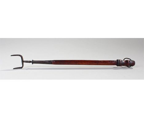 19th Century toasting fork, the turned handle with steel fork end, 38cm long
