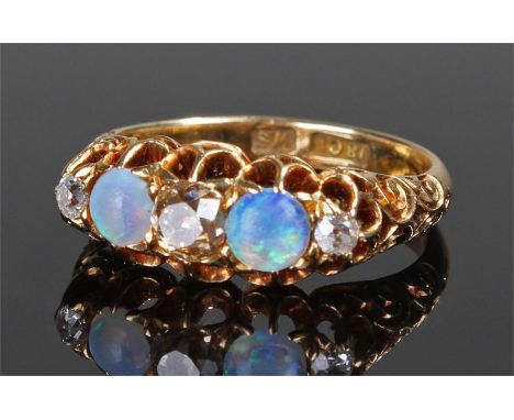 18 carat gold diamond and opal set ring, with three diamonds separated by two opals, ring size P