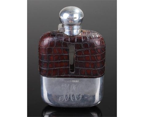 Victorian silver, leather and glass hunting flask, Sheffield 1896, Maker James Dixon & Son, the twist lock cap above a glass 