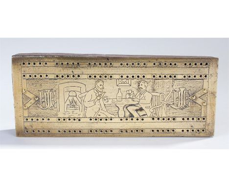 Victorian cribbage board, the brass top engraved with a living room scene, two gentleman drinking and playing cards, 21cm lon