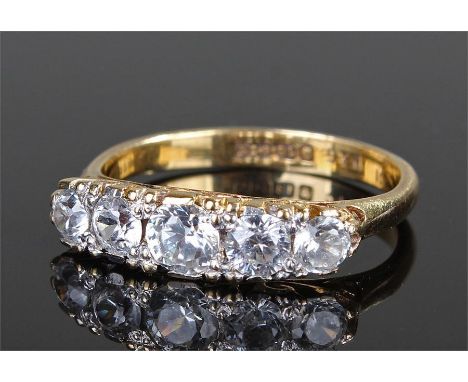 18 carat gold diamond set ring, with a row of five diamonds, ring size N 1/2