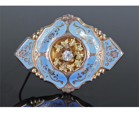 Victorian yellow metal and enamel brooch, the central paste stone with blue enamel, swag design, glass locket backed, 53mm di
