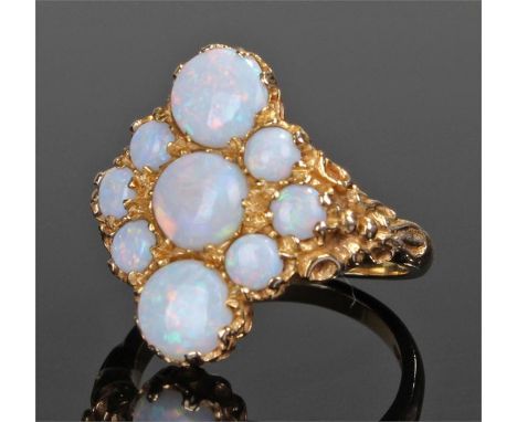 9 carat gold opal ring, set with nine opals, ring size M 1/2