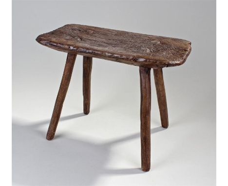 19th Century primitive stool, the rectangular top above four legs, 39cm x 23cm x 30cm
