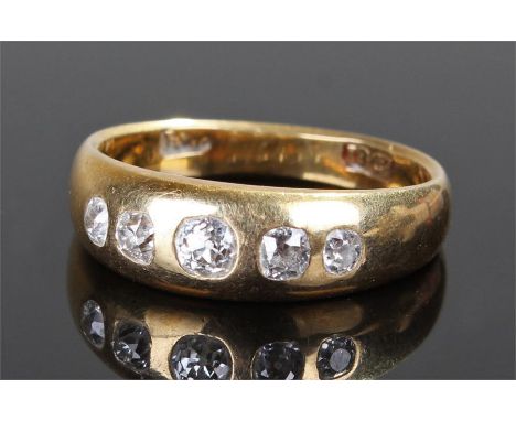 18 carat gold diamond set ring, with a row of five diamonds, ring size R