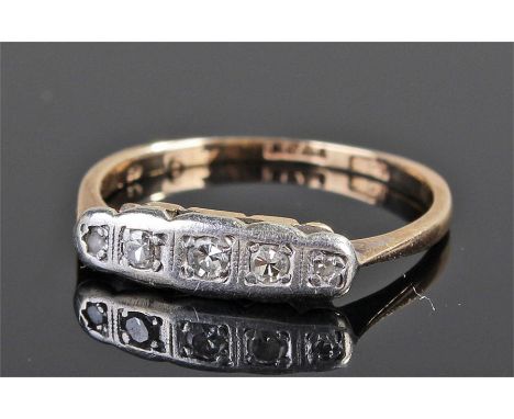 18 carat gold diamond set ring, five diamonds in a platinum mount, gold shank, ring size M