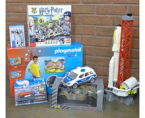 A Playmobile City Life, Harry Potter Lego, boxed, Hot Wheels, Police Car, Playmobile rocket, a Maisto Humvee car and Mattel W