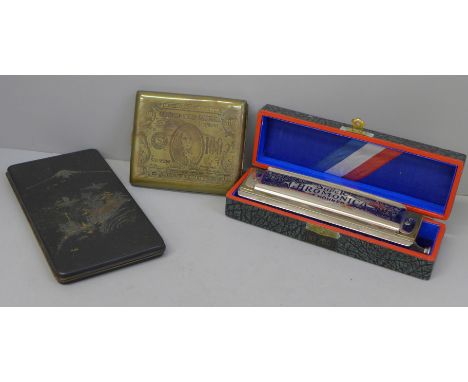 Two cigarette cases and a cased Hohner Super Chromonica harmonica 