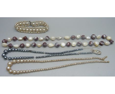 Two faux pearl necklaces, a/f, a faux pearl bracelet and a string of real pearls and beads with silver clasp 