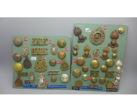 A collection of Royal Engineers and Army Ordnance Corps cap badges and insignia 