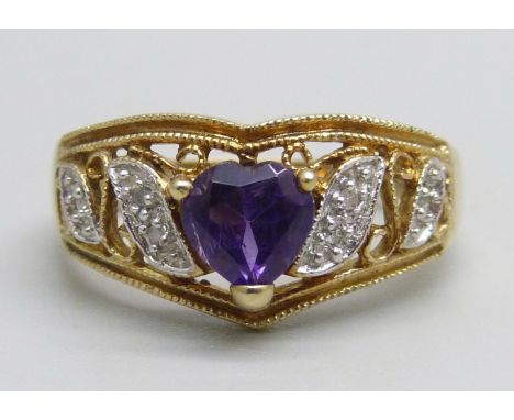 A 9ct gold ring set with an amethyst and diamond chips, 3g, P 