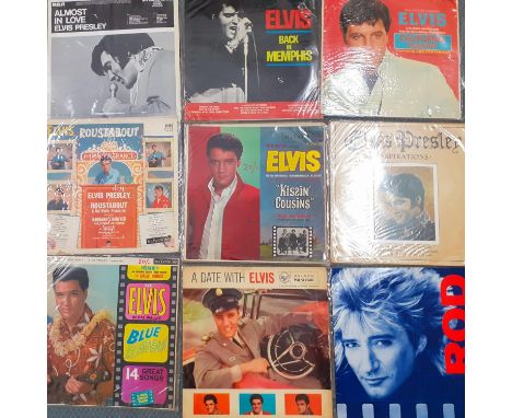 A quantity of mid to late 20th Century LP's to include Elvis and Rod Stewart together with 4 singles. 