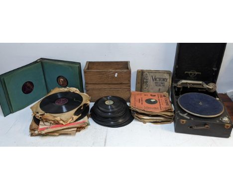 A Columbia wind-up gramophone, together with mixed 78rpm records Location: 