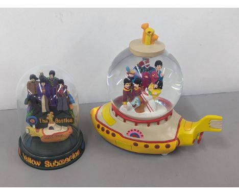 The Beatles, Yellow Submarine limited edition figure group by The Franklin Mint, together with a 'The Beatles Yellow Submarin