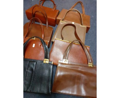 A quantity of vintage handbags to include a Jane Shilton genuine black lizard handbag, leather examples and a Jane Shilton mi