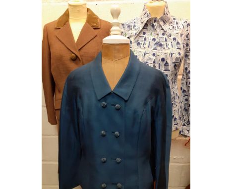 A mid 20th Century A ntler Sunseeker suitcase and contents to include a blue Dereta ladies 2 piece skirt suit, 26" waist x 36
