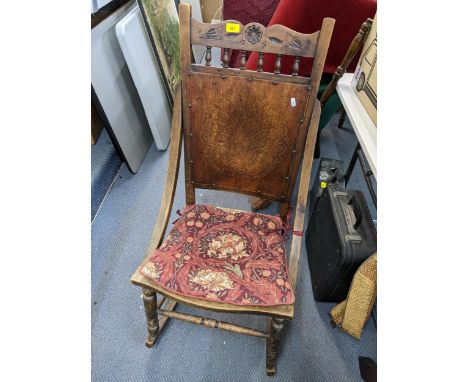 An Edwardian beech rocking chair having carved panelled  back and seat, together with a late 19th century horses hair and mah