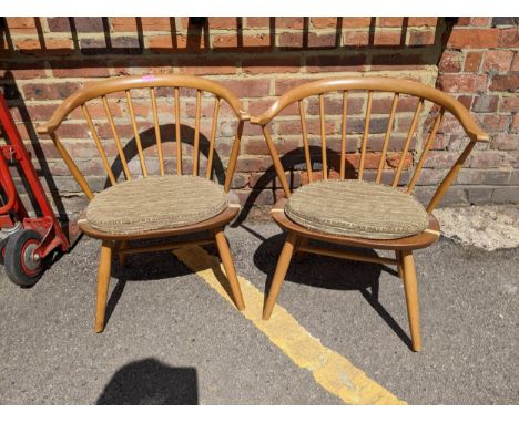 A pair of Ercol beech Captain's style chairs Location: G 