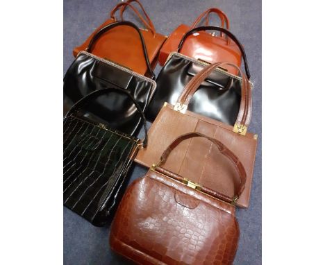 A quantity of vintage handbags to include Eros, a Jane Shilton mid brown genuine lizard handbag with gold tone hardware and a