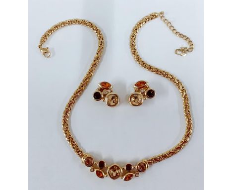 Christian Dior-A 1980's gold tone jewellery suite comprising a gold tone necklace with amber coloured, clear and tourmaline c