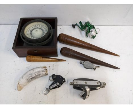 Boat related items to include a bearing block, a resin scrimshaw, fids, a reel and a Richie Boston American compass and a pon