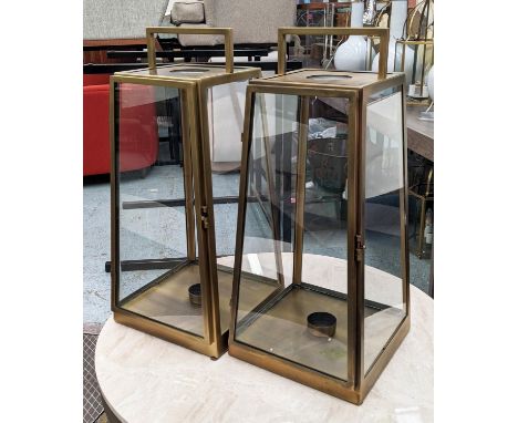STORM LANTERN, a pair, each 78cm H x 37cm x 57cm, antiqued bronzed finish. (2) 