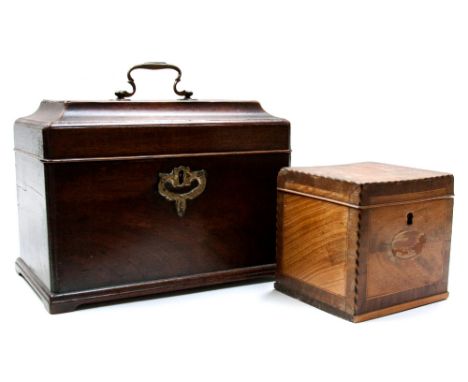 An 18th century mahogany tea caddy, circa 1750, cuboid form with ogee domed top and brass swan neck handle, 24cm wide, 18cm h