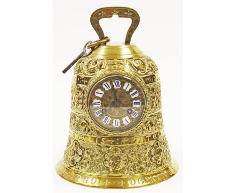 A gilt brass mantle clock in the form of a bell, the 4 inch dial with enamelled Roman numeral markers, cast with bands of scr