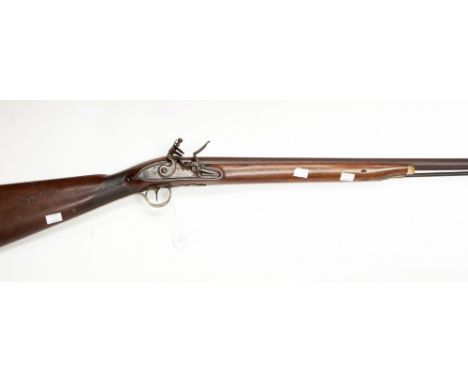 A rare single barrel 14 bore flintlock 'Bank Gun' fitted with a 67" (5' 7") barrel, the lock is marked Manton and the barrel 