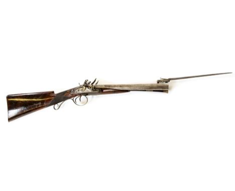 A double barrel side by side half stocked flintlock blunderbuss fitted with flared damascus barrels, the locks are of the lat