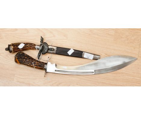 Two knives, to include a modern custom made kukri and a German single edged spearpoint hunting knife in Damascus steel by J.A