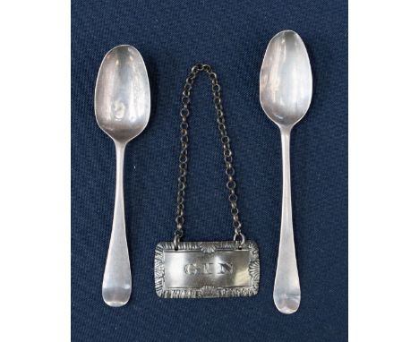 Two bottom struck silver teaspoons and a Georgian 'Gin' silver bottle ticket (3)