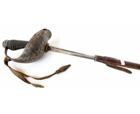 A British cavalry officers sword, 1912 pattern with 86cm blade embossed with the Royal standard and foliate decoration named 