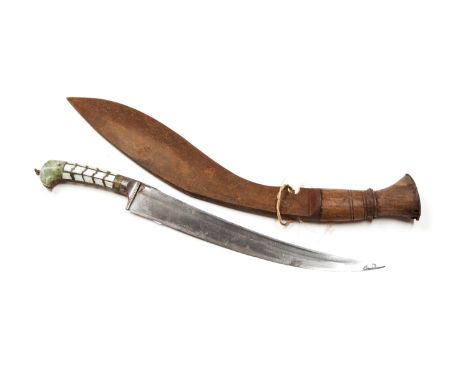 Two Eastern knives to include a nineteenth century kukri with 31cm blade, no markings, two fullers, no scabbard and a ninetee