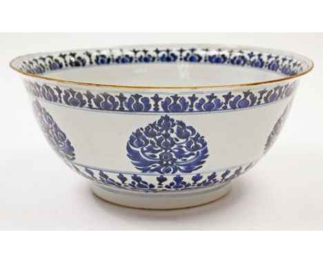 A Chinese exportware blue and white bowl, mid 17th century, possibly for the Persian market, the exterior painted with six fl